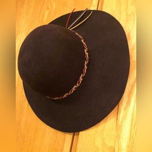 BCBG Wool hat with tri-color woven leather hatband.